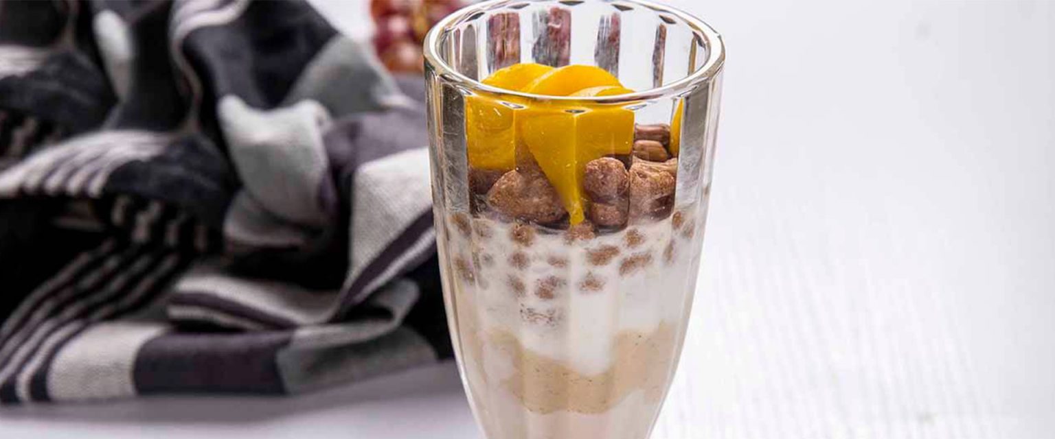 Peach, Coco pop and Greek Yogurt Porridge Pachamama Foods